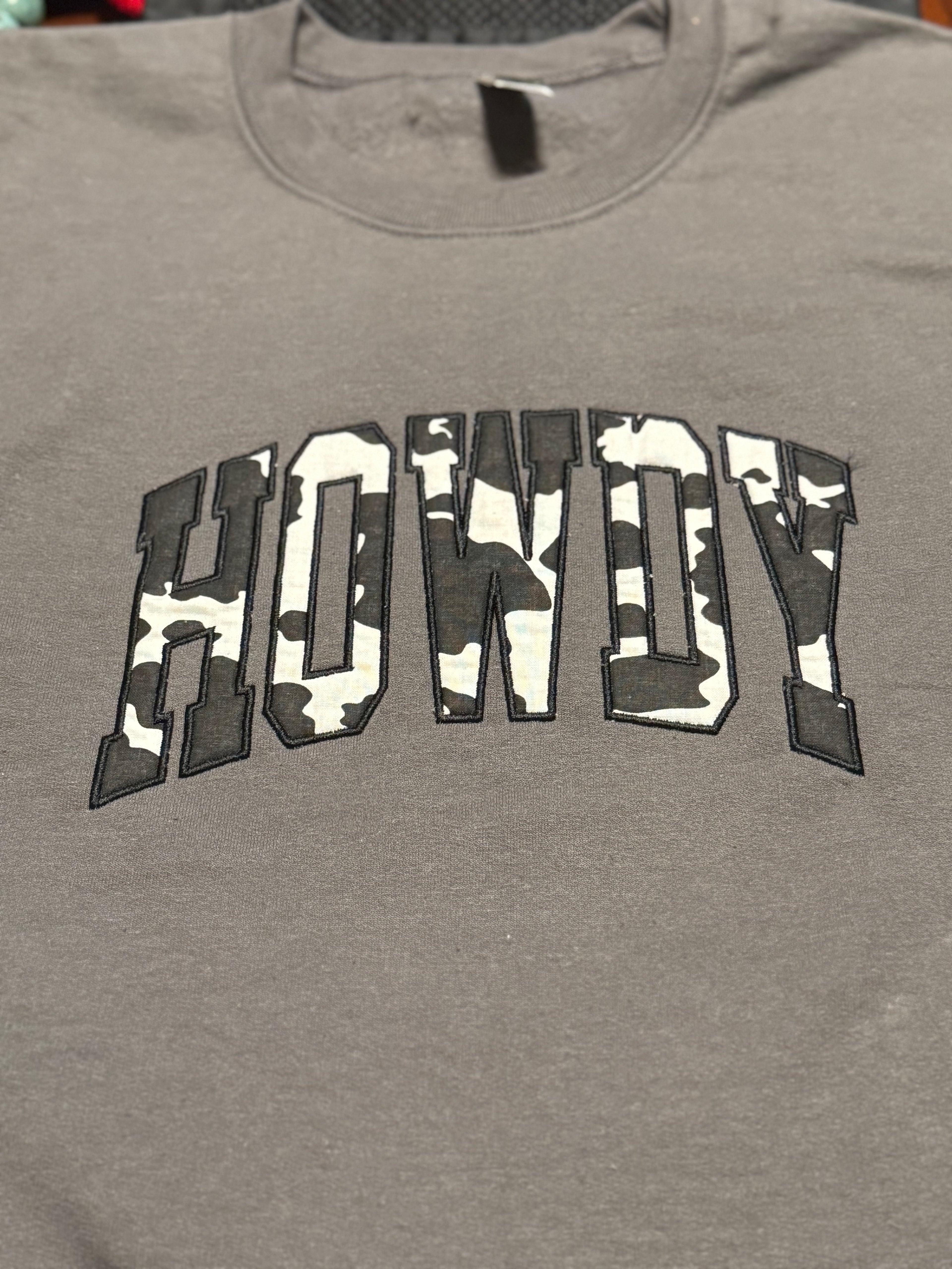 Howdy cowprint embroidered sweatshirt