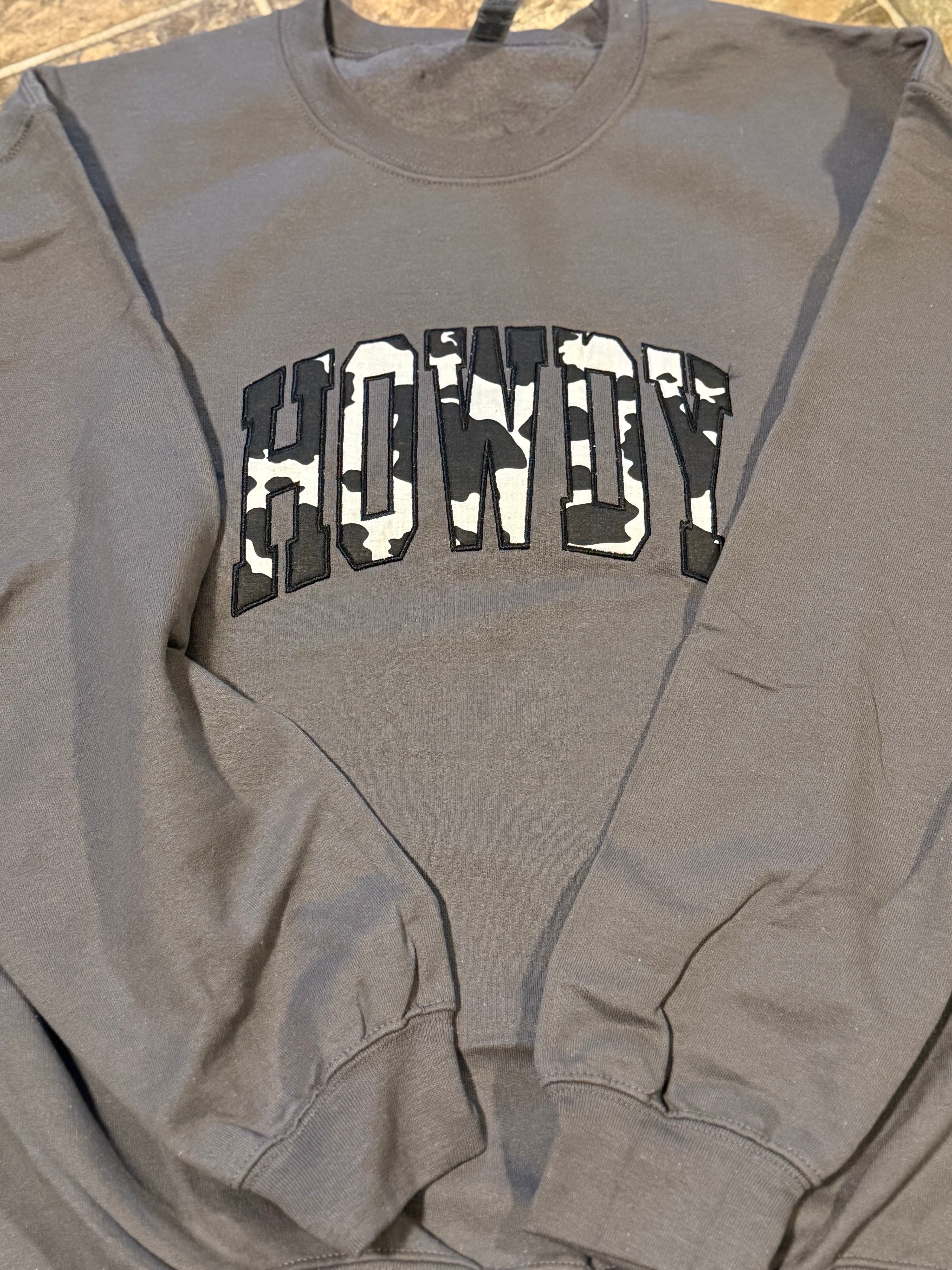 Howdy cowprint embroidered sweatshirt