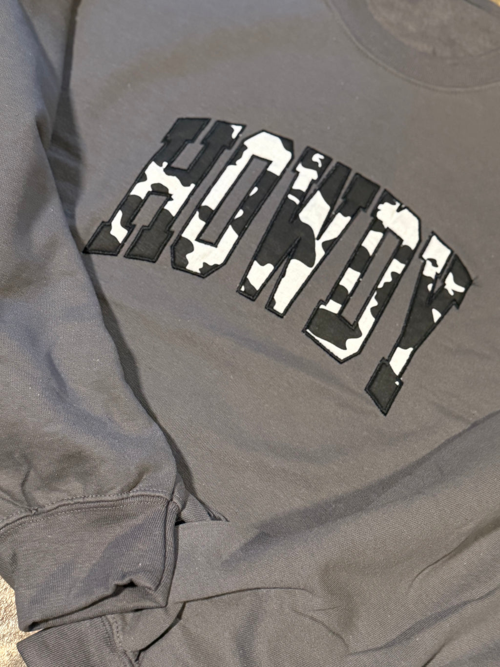 Howdy cowprint embroidered sweatshirt