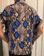 Women’s Short Sleeve Tie Front PomPom Animal Print Top