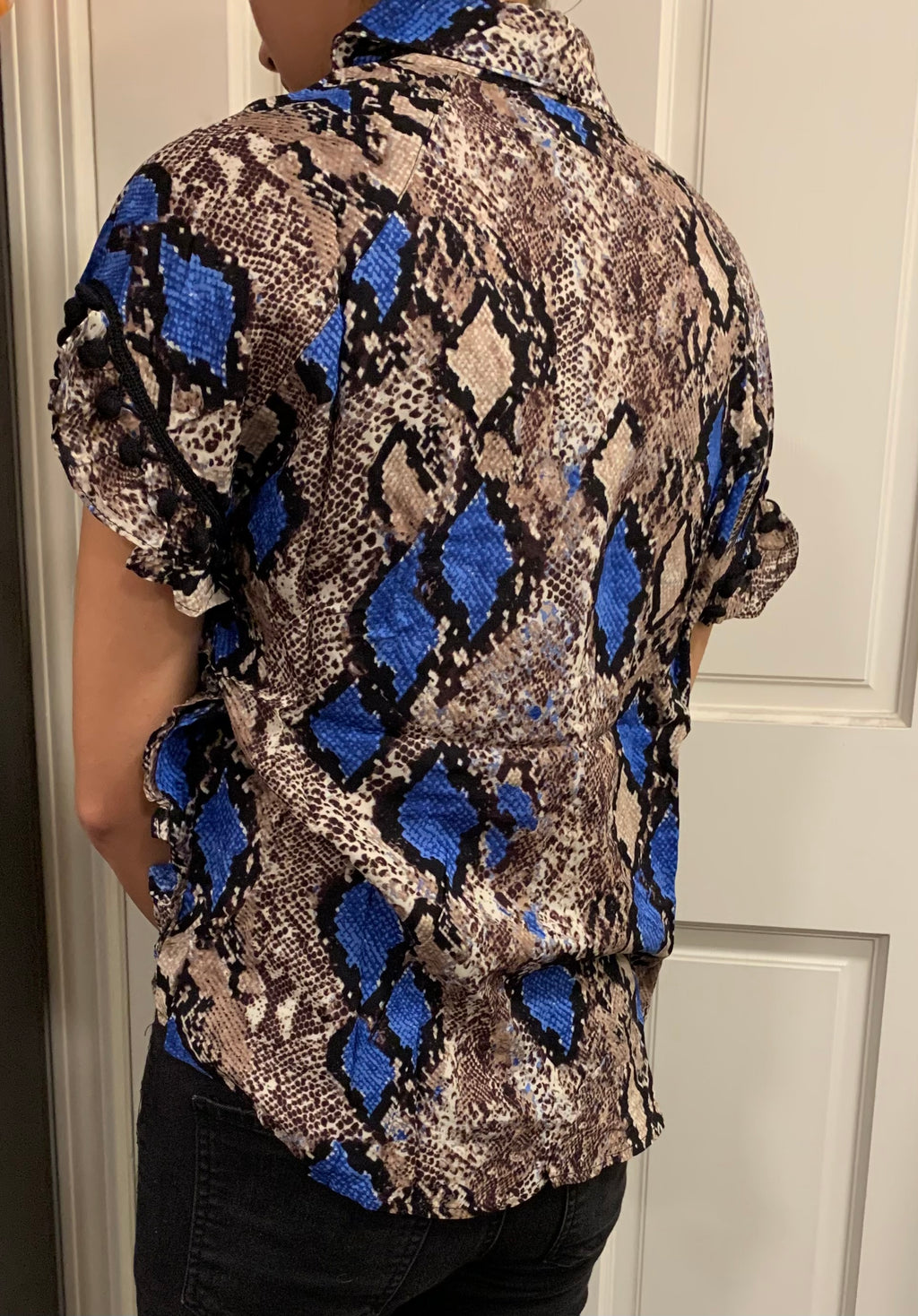 Women’s Short Sleeve Tie Front PomPom Animal Print Top